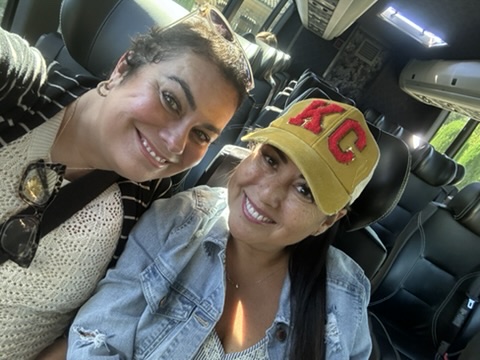 Two Benefits Boss teammates on a team road trip
