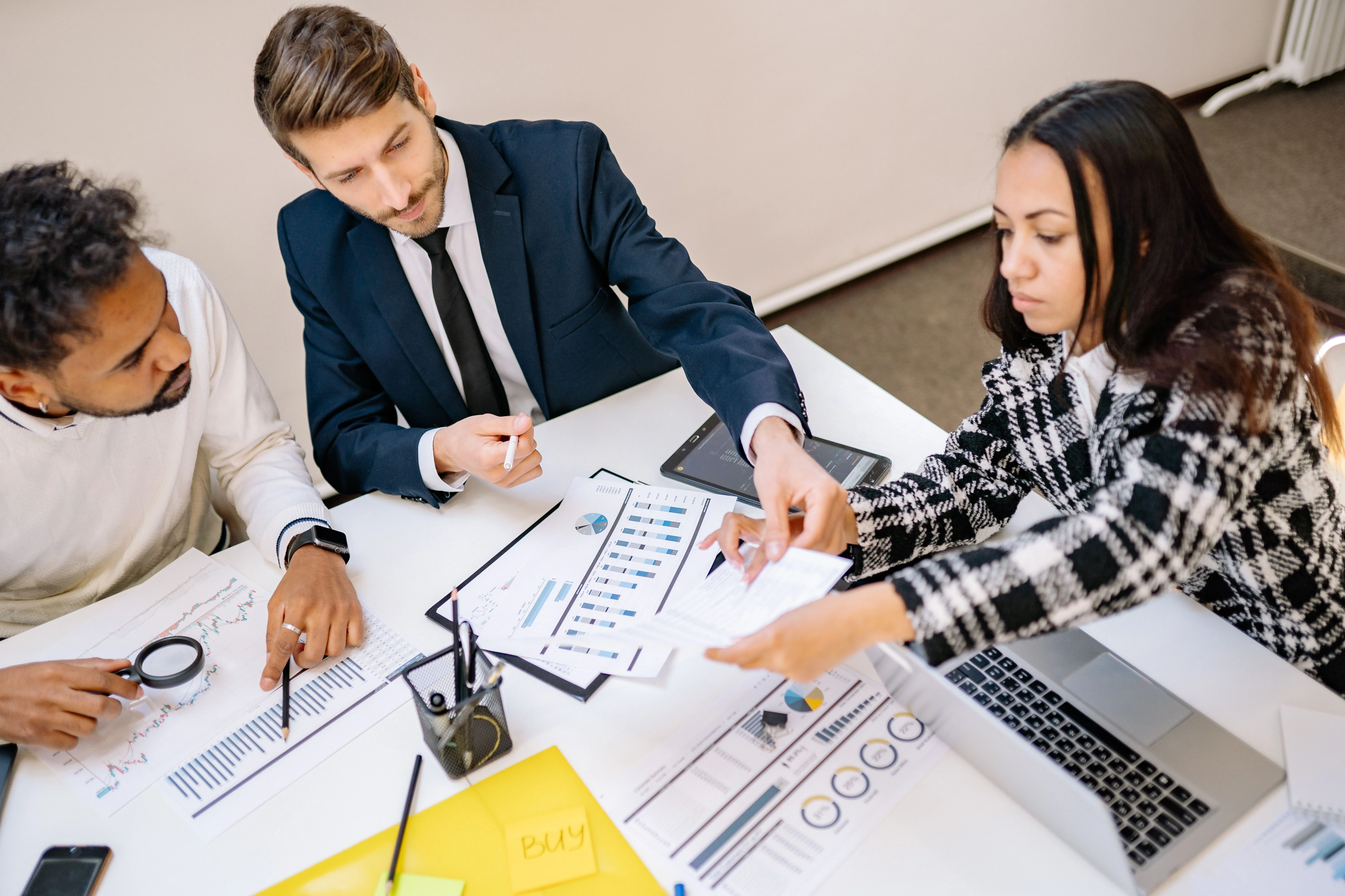 broker explaining difference between deductible and out of pocket maximum