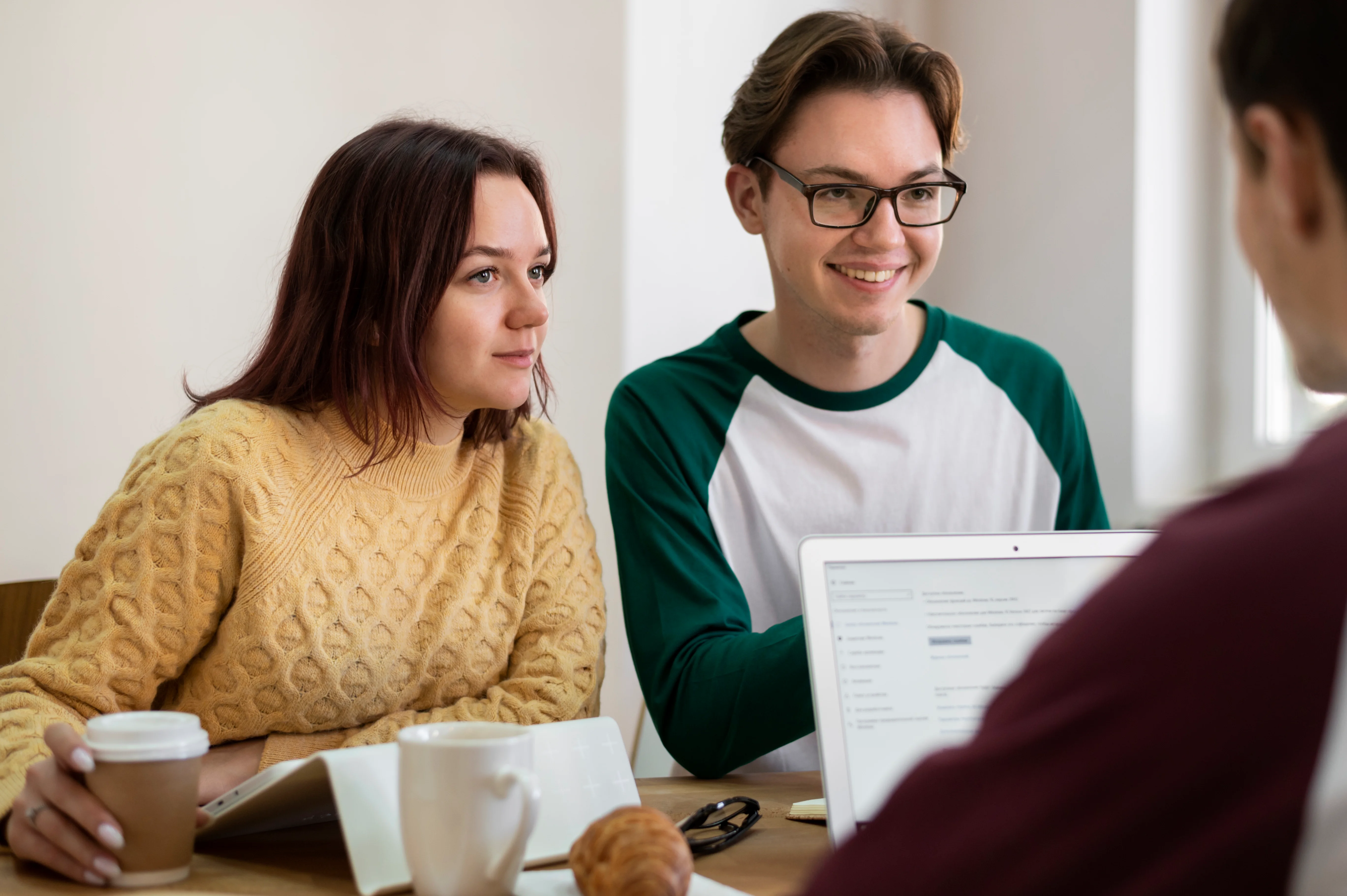 clients discussing insurance options with freelance business owners