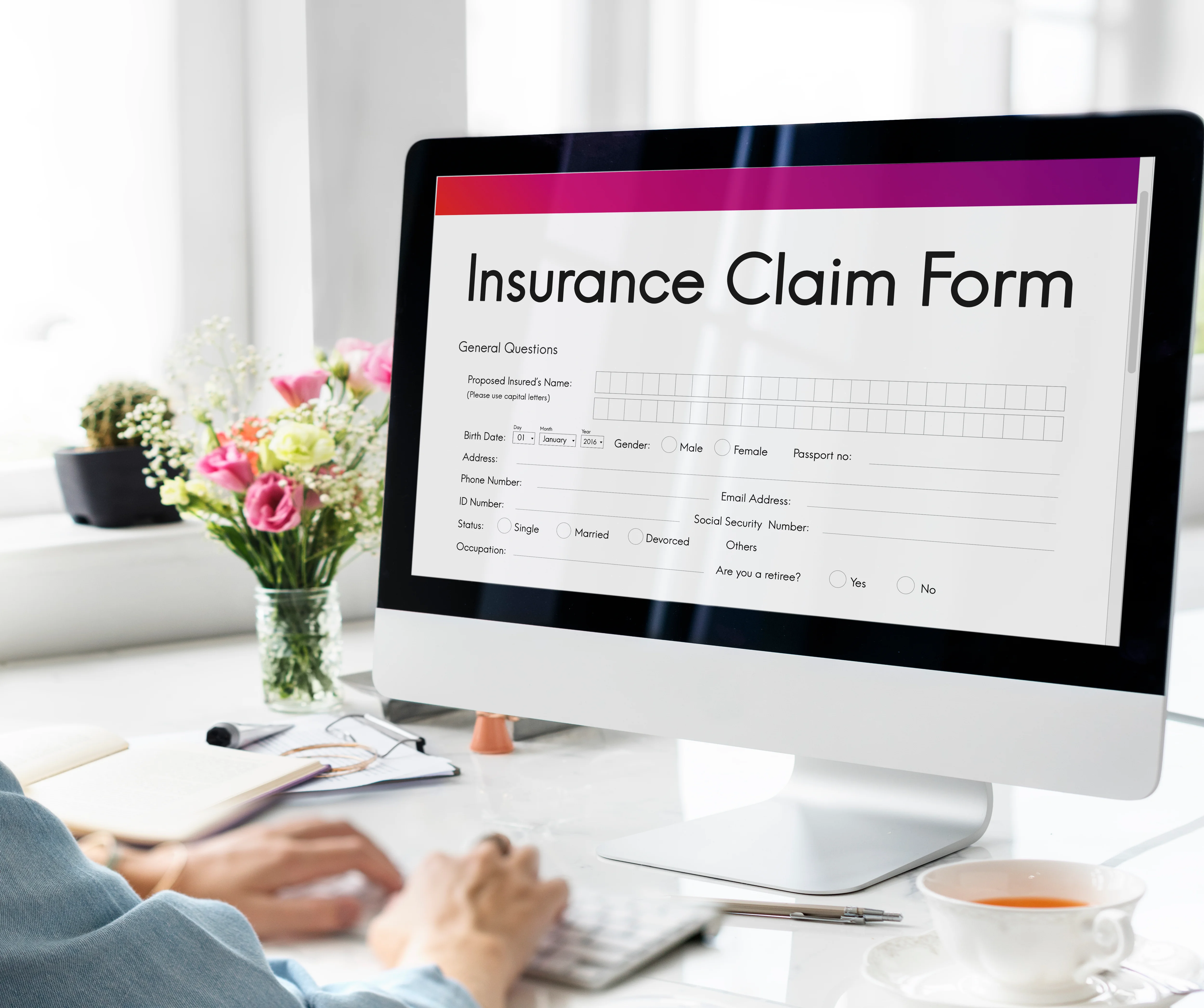 Close up of computer monitor with online insurance claim form (1)