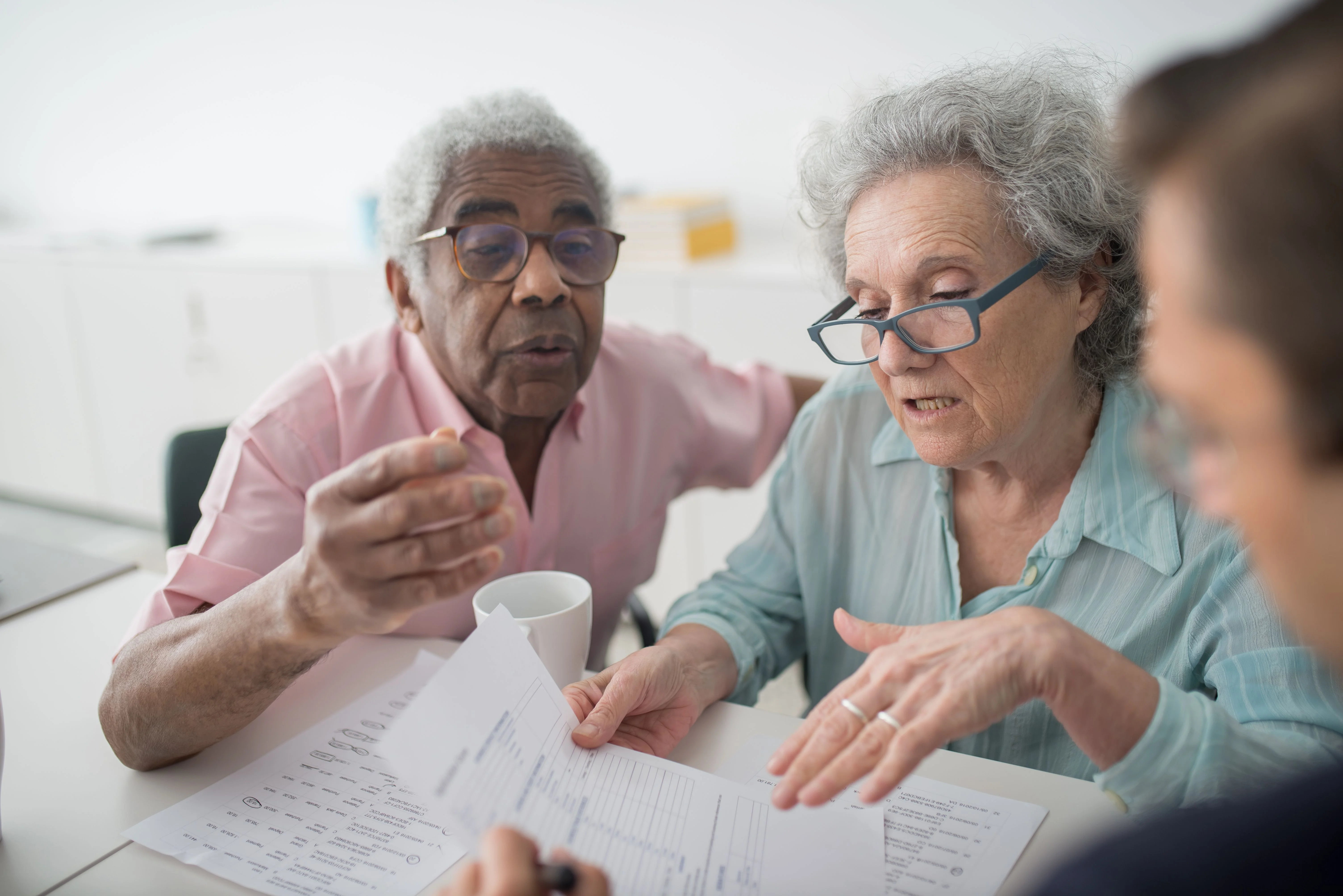 couple reviewing out of maximum terminology with broker