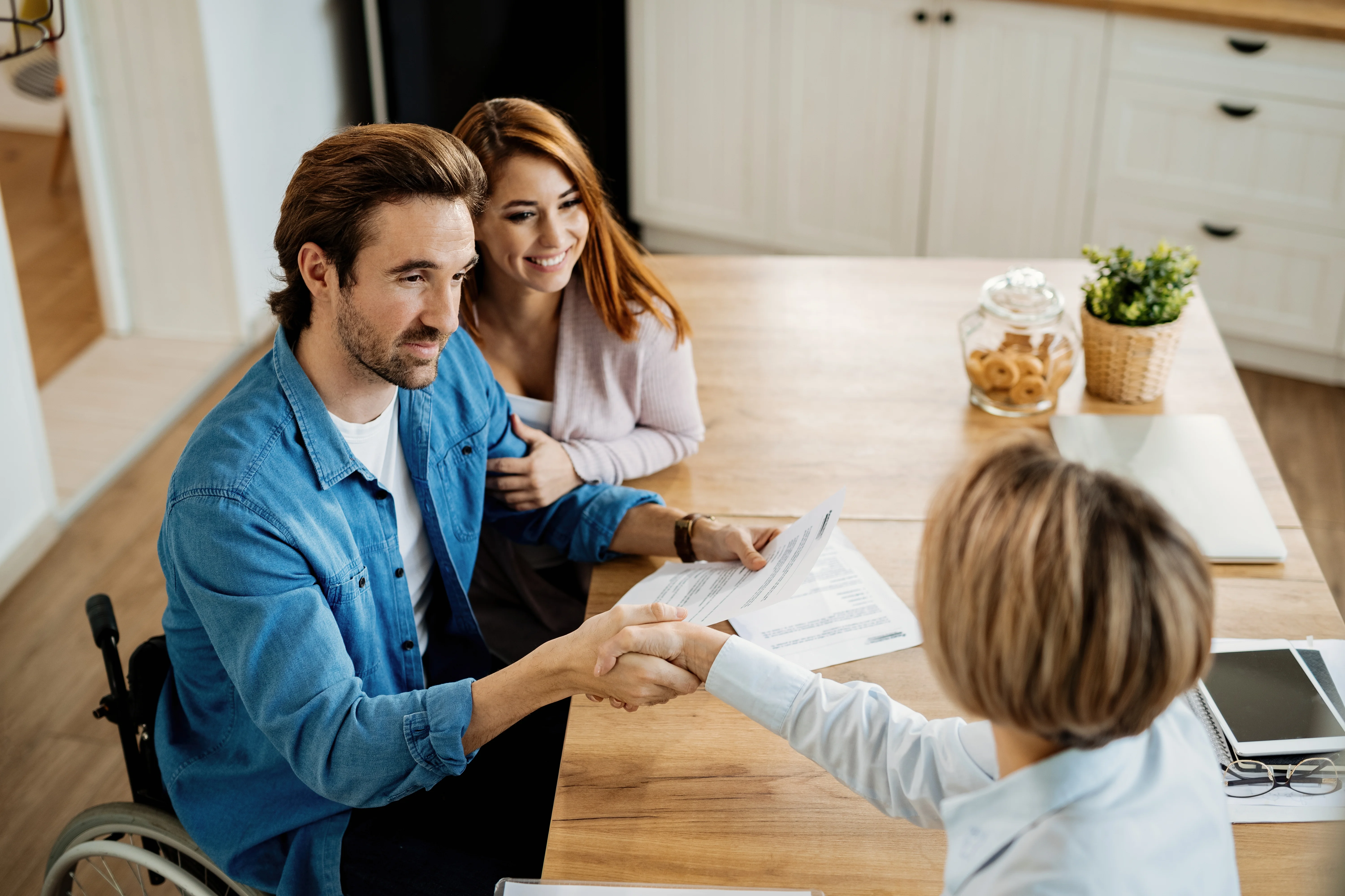 Freelance business owners discussing insurance options with insurance broker