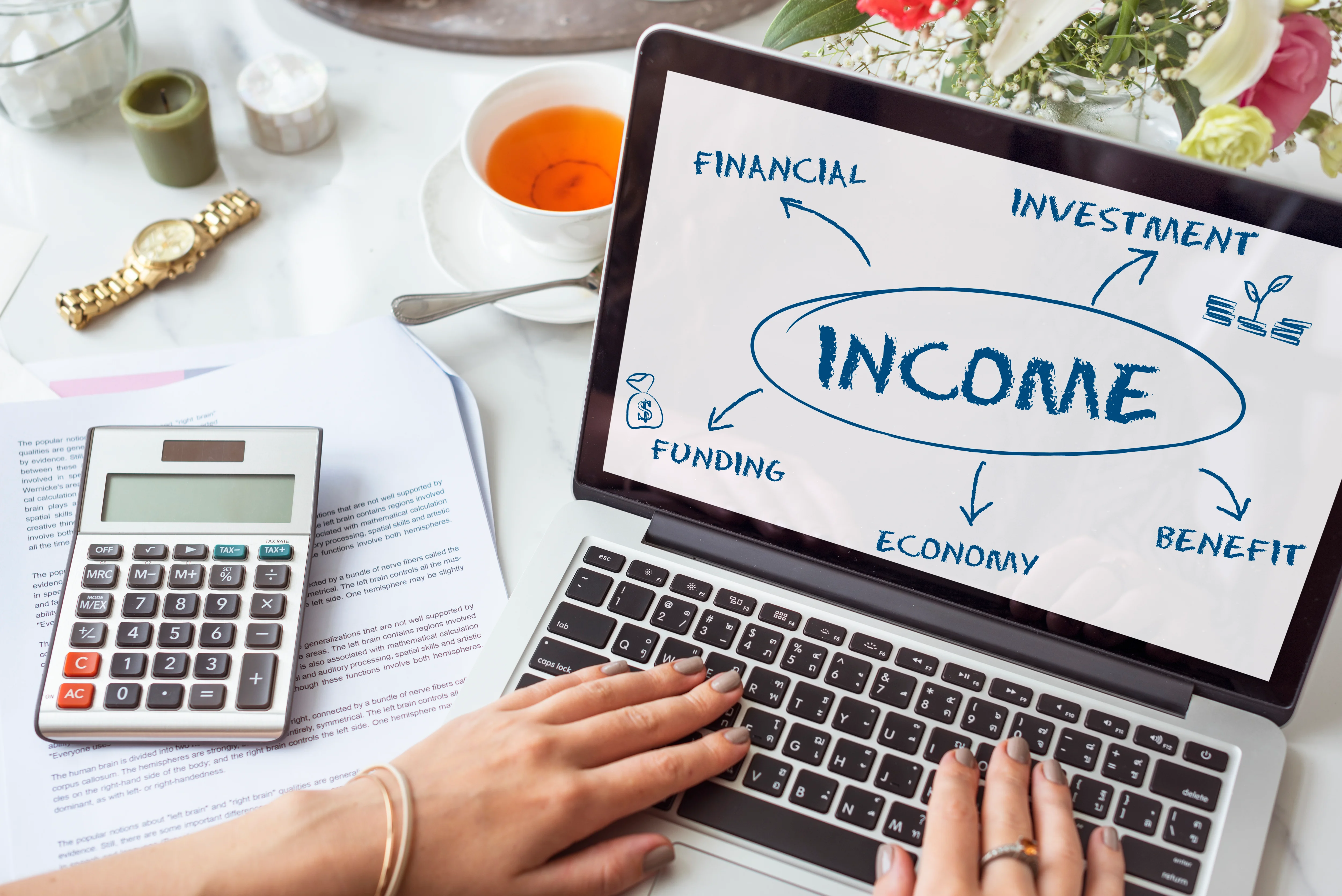 Laptop displaying income, investment and financial planning concepts for high income earner tax strategies